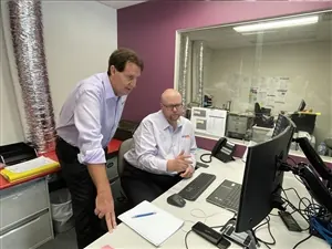 Consultants working together at a desk